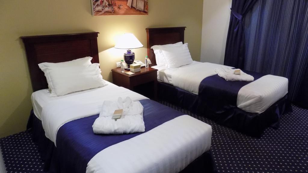 Onizah Hotel Unaizah Pokoj fotografie